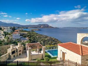 a villa with a view of the water at Hectoras Villa in Plaka BY APOKORONAS-VILLAS in Plaka