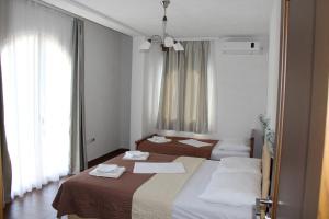 Cama o camas de una habitación en Apartments Ismailaga