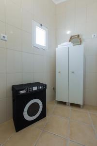 Ett badrum på Quinta das Palmeiras