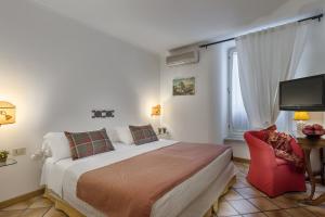 Postel nebo postele na pokoji v ubytování Weekend a Napoli