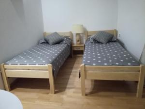 Postel nebo postele na pokoji v ubytování Guest House Kvartin