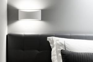 Łóżko lub łóżka w pokoju w obiekcie Gkeea Boutique Hotel