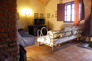 TV a/nebo společenská místnost v ubytování Agriturismo Borgo Santa Maria