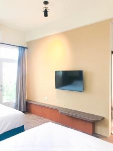 TV a/nebo společenská místnost v ubytování Wang yuan B&B