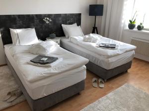 Posteľ alebo postele v izbe v ubytovaní Pension Skylark