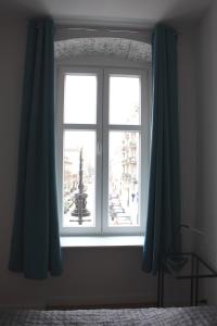 Łóżko lub łóżka w pokoju w obiekcie Stay99