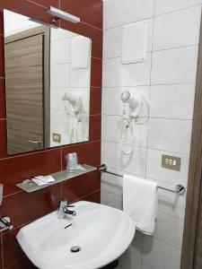 Ванная комната в Hotel Likos