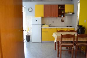 Kuchyň nebo kuchyňský kout v ubytování Apartments Lera