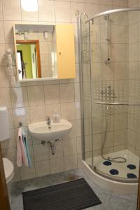 Koupelna v ubytování Apartments Lera