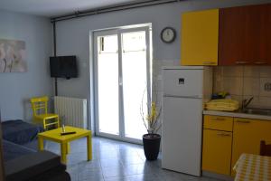 Kuchyň nebo kuchyňský kout v ubytování Apartments Lera