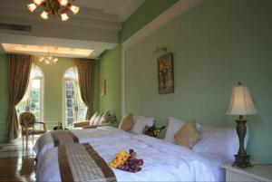Voodi või voodid majutusasutuse My Chateau Resort toas