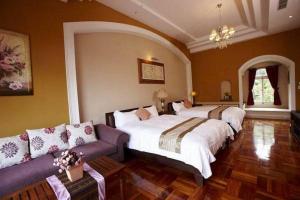 Voodi või voodid majutusasutuse My Chateau Resort toas