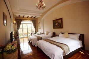 Voodi või voodid majutusasutuse My Chateau Resort toas