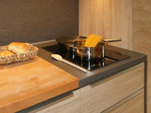 A cozinha ou cozinha compacta de Apartments Ploner