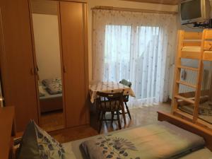 Postel nebo postele na pokoji v ubytování Haus Heimo