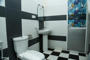 Ένα μπάνιο στο One-plus Holiday Homes Mirissa