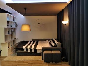 Łóżko lub łóżka w pokoju w obiekcie Lux Apartment Modern