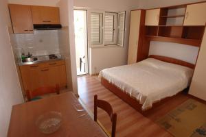 Kuchyň nebo kuchyňský kout v ubytování Apartments Leontina