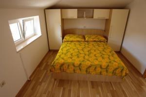 Postel nebo postele na pokoji v ubytování Apartments Leontina