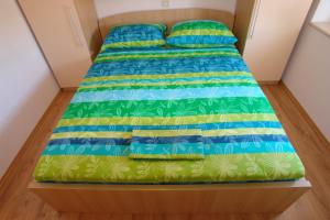 Postel nebo postele na pokoji v ubytování Apartments Leontina