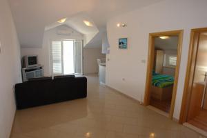 Kuchyň nebo kuchyňský kout v ubytování Apartments Leontina