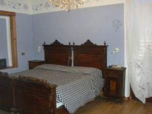 Postel nebo postele na pokoji v ubytování Albergo San Cristoforo