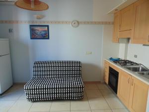 A kitchen or kitchenette at Residence Massilor