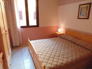 A bed or beds in a room at Residence Massilor
