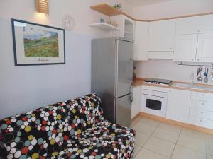A kitchen or kitchenette at Residence Massilor
