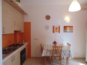 A kitchen or kitchenette at Residence Massilor