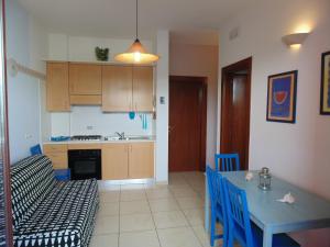 A kitchen or kitchenette at Residence Massilor