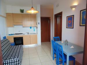 A kitchen or kitchenette at Residence Massilor