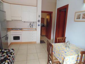 A kitchen or kitchenette at Residence Massilor