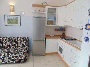 A kitchen or kitchenette at Residence Massilor