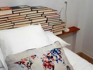 Posteľ alebo postele v izbe v ubytovaní La Librería de Viana