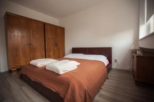 Posteľ alebo postele v izbe v ubytovaní RiverView apartment