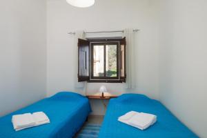 מיטה או מיטות בחדר ב-Casas Bemposta