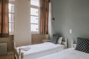 Postel nebo postele na pokoji v ubytování Faidra + 20 fotografií