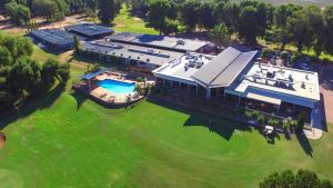 an aerial view of a large building with a swimming pool at Renmark Country Club in Renmark