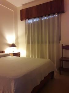 Una cama o camas en una habitación de Hotel Molise