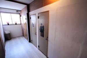 Postel nebo postele na pokoji v ubytování Hai Lodge