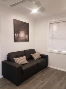 A seating area at Edwin Place Apartment