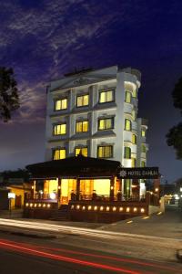 a hotel building with lights in front of it at Dahlia Boutique Hotel in Pokhara
