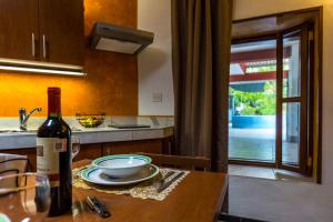 Kuchyň nebo kuchyňský kout v ubytování Merida Serviced Apartments