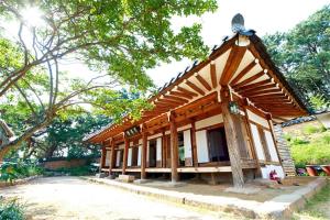 a small building with a roof on top of it at Wolamjae in Gyeongju