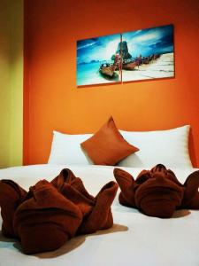 Katil atau katil-katil dalam bilik di Prukrom Lanta Guesthouse