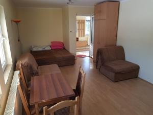 Ein Sitzbereich in der Unterkunft Apartment Oaza Mira
