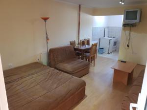 Ein Sitzbereich in der Unterkunft Apartment Oaza Mira