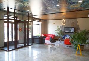 TV a/nebo společenská místnost v ubytování Hotel Chalpan