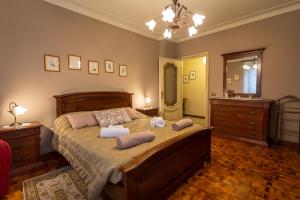 Postel nebo postele na pokoji v ubytování Villa Anselma